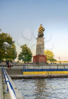 Kherson, Ukraine - 04.27.2019. Monument to the first shipbuilders in Kherson in the spring evening