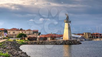 Nessebar, Bulgaria – 07.10.2019.  Monument to St Nicholas in front of the main entrance to the old town of Nessebar, Bulgaria on a sunny summer morning