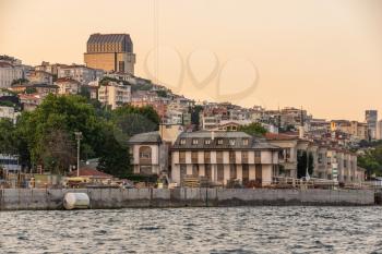 Istambul, Turkey – 07.12.2019. Panoramic view from the sea to the right bank of the Bosphorus at sunset