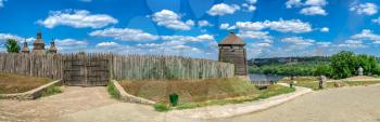 Zaporozhye, Ukraine 07.20.2020. External walls, wooden fence and watchtowers of the National Reserve Khortytsia in Zaporozhye, Ukraine, on a sunny summer day