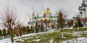 Pochaev, Ukraine 01.04.2020.  Holy Dormition Pochaev Lavra in Pochaiv, Ukraine, on a gloomy winter morning before Orthodox Christmas