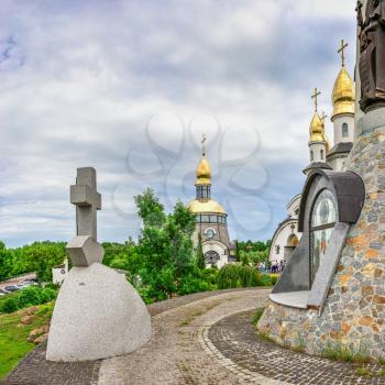 Buki, Ukraine 06.20.2020. Temple Complex with landscape Park in Buki, Ukraine, on a cloudy summer day