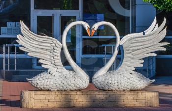Berdyansk, Ukraine 07.23.2020. Swans Sculpture in Berdyansk, Ukraine, on a summer morning