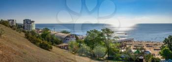 Chernomorsk, Ukraine 08.22.2020. Panoramic view of the Public beach in Chernomorsk city on a sunny summer morning