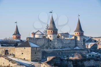 Kamianets-Podilskyi, Ukraine 01.07.2020. Panoramic view of the Kamianets-Podilskyi fortress on a sunny winter morning