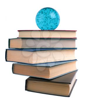 Staircase from books and glass ball isolated on a white background