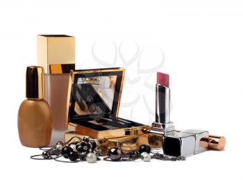 Cosmetics and adornments isolated on white background