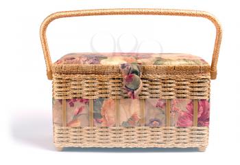 Knitting basket with flower pattern isolated on white background