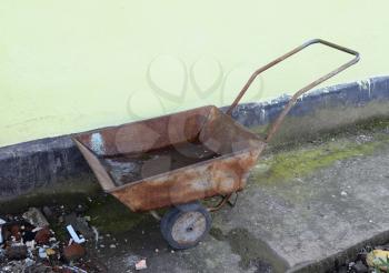 Trolley for transportation of goods in the household. Wheelbarrow for litter.