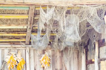 Fishing nets hanging under the canopy. Hanging objects thatched roof.