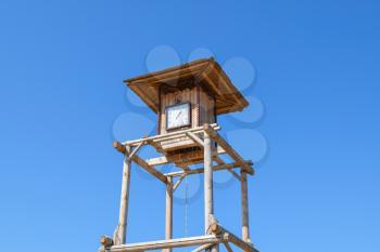 The wooden clock tower. for time tracking in a village in the old days.