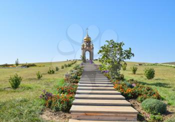 Orthodox chapel on a hill. Tabernacle in the Cossack village of Ataman. The stairs leading to the chapel.