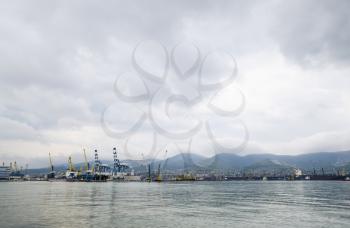 Novorossiysk, Russia - May 28, 2016: The international sea port of Novorossiysk. Port cranes and industrial objects. Marine Station.