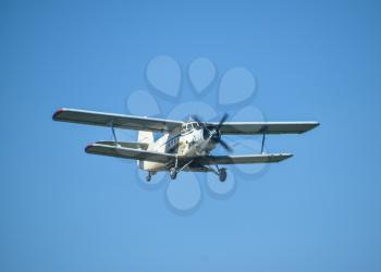Aircraft agricultural aviation AN-2. The spraying of fertilizers and pesticides on the field with the aircraft.