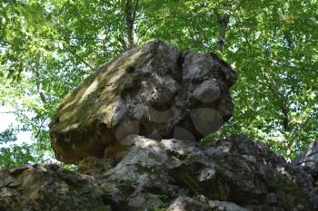 Devil's Finger. The rock damaged by explosion in the woods of Kuban.