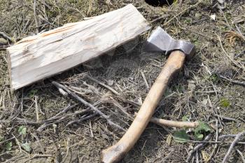Chopping wood with an ax. Chopping wood