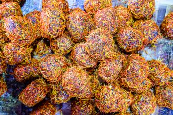 Marmalade balls, sprinkled with dried berries and sweet sawdust
