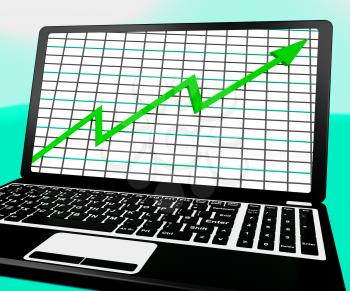 Arrow Going Up On Laptop Shows Statistics Reports And Business Profits