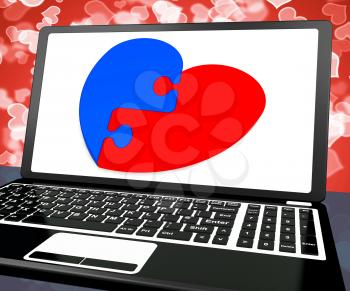 Puzzle Heart On Laptop Shows Engagement And Marriage