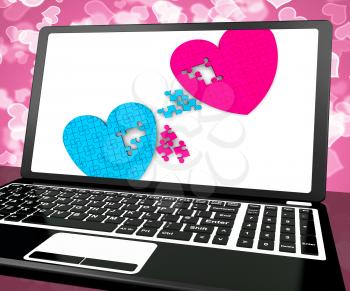 Two Hearts On Laptop Shows Love, Commitment And Relationships