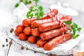 Sausages on white background