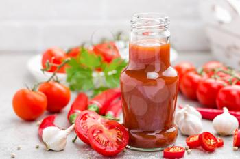Tomato ketchup, chilli sauce, tomatos puree with chili pepper, tomatoes and garlic