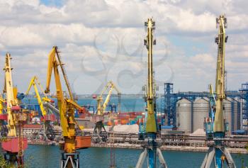 Cranes, tanks and containers in marine cargo port.Sea Port of Odessa