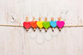heart rainbow of colors on a white wooden background,LGBT symbol
