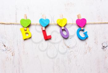 the word blog of colored letters on a white background