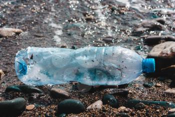 plastic bottle in water. Concept of pollution of the environment, ocean, sea, nature. Save the planet..zero waste
