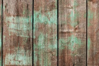 Old vintage wooden background with shabby green paint