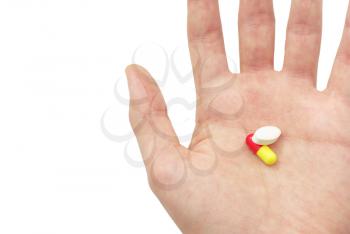 Two pills on the palm. Element of design.