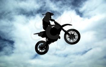 Moto racer on sky background. Sport desogn.