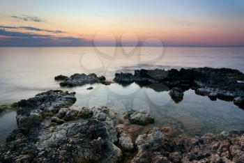 Seascape. Sunset and rocks. Nature composition.