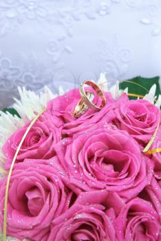 Bouquet and wedding rings. Element of design.