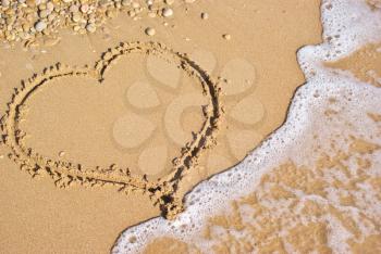 Heart sign on beach. Element of design.