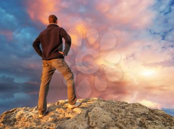 silhouette of man on top of mountain. Conceptual scene.