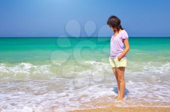Girl on the beach. Conceptual scene.