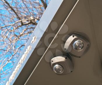 Camera surveillance. Surveillance camera at a bus stop