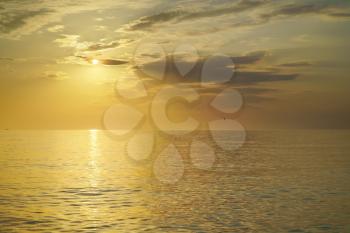 Golden sunset sea background. Abstract light way to the sun. Nature composition.