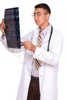Young male doctor looking at tomography brain, isolated over white