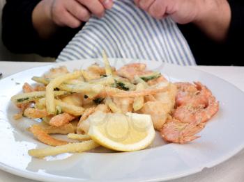 Hot and cold snacks from barnacles, fish and shrimp. The Mediterranean cuisine of Italy.