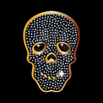 Golden skull with jewels and diamonds as a pendant and an ornament. The magical Golden skull.
