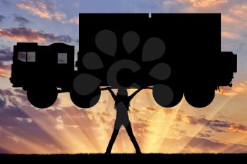Silhouette of strong feminist, lifting trucks. Concept of feminism.