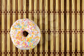Donut in white glaze. design element