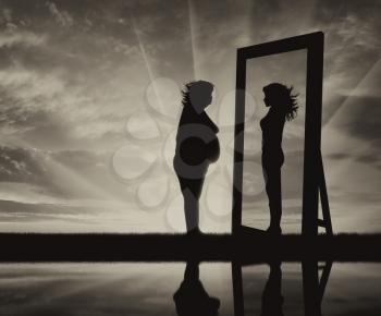 concept of fight against obesity and the desire to be slim. Silhouette thick and slender woman reflected in a mirror