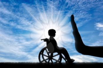 disabled child in a wheelchair and a gesture of the hand stop. Social Issues concept