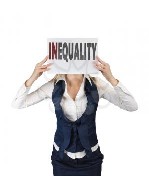 White girl holding a sheet of paper with word inequality, at face level. Social inequality concept