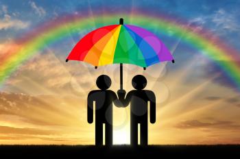 Two gay men under a rainbow umbrella on a sunset background
