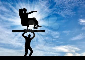 Silhouette of a selfish man sitting in a chair, points to another man who carries it, where to move. The concept of selfish behavior towards other people